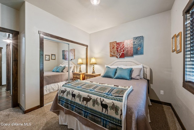 carpeted bedroom featuring a closet