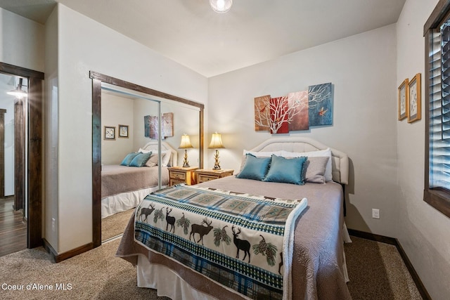 648 Curley Creek Rd, Moyie Springs, ID 83845 - bedroom featuring carpet, a closet, and baseboards