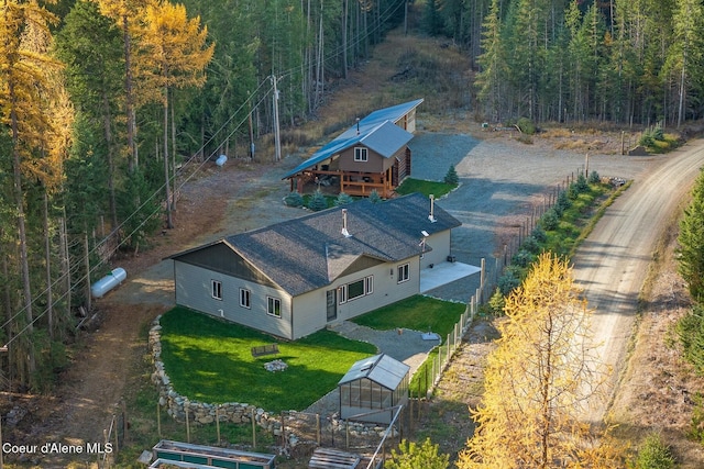 648 Curley Creek Rd, Moyie Springs, ID 83845 - aerial view of property and surrounding area featuring a heavily wooded area