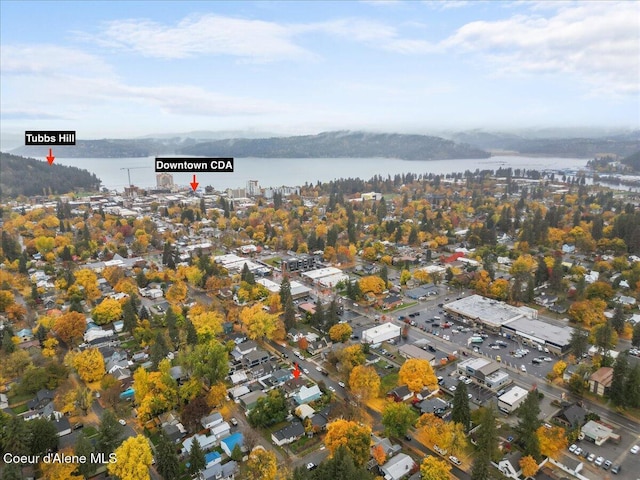 aerial overview of property's location featuring a nearby body of water