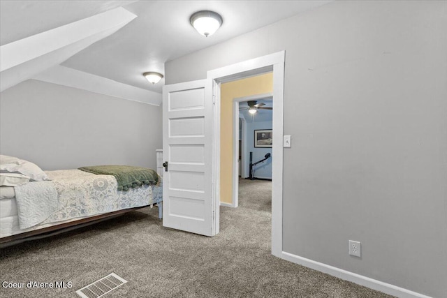 carpeted bedroom with baseboards