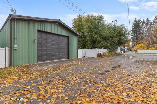 detached garage with fence