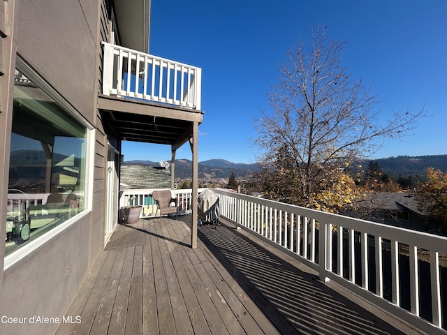 deck with a mountain view