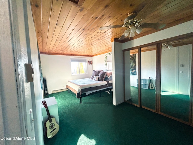 unfurnished bedroom featuring baseboard heating, ceiling fan, carpet flooring, and wooden ceiling