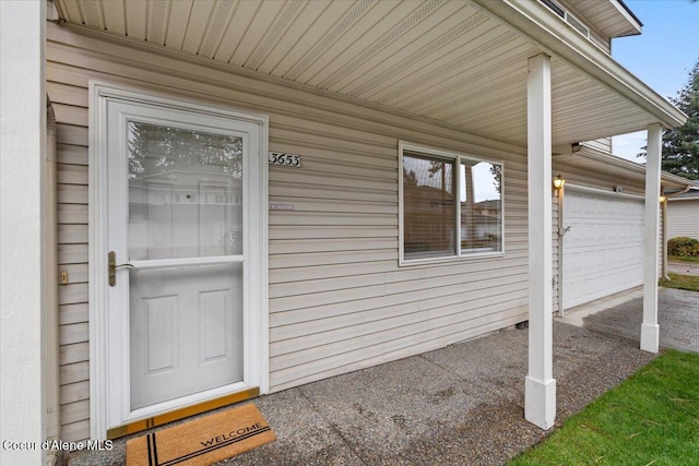 property entrance featuring a garage