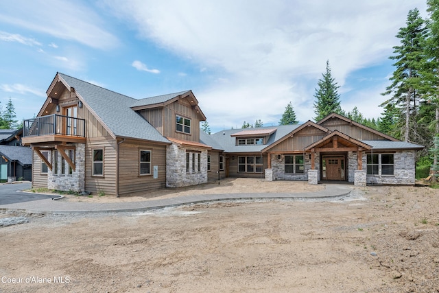 craftsman house with a balcony