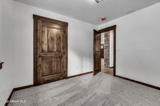 unfurnished bedroom featuring carpet floors