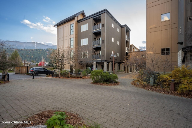 view of building exterior with a mountain view