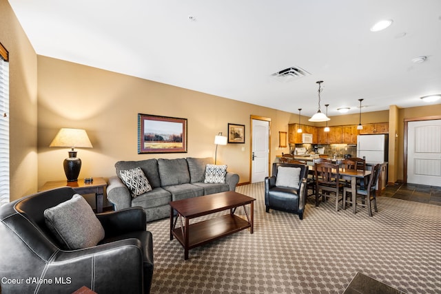 living room with light carpet