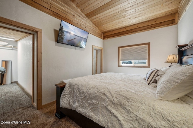 carpeted bedroom with wood ceiling and vaulted ceiling