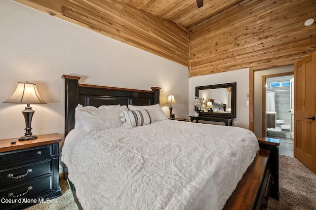 carpeted bedroom featuring wooden ceiling, connected bathroom, and high vaulted ceiling