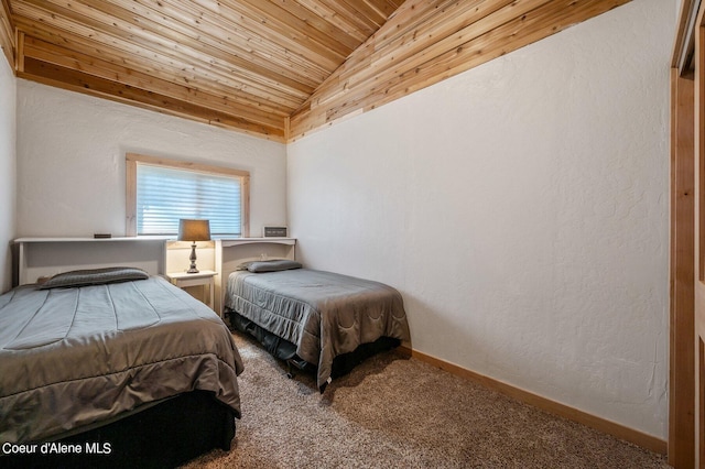 bedroom featuring wooden ceiling, vaulted ceiling, and carpet