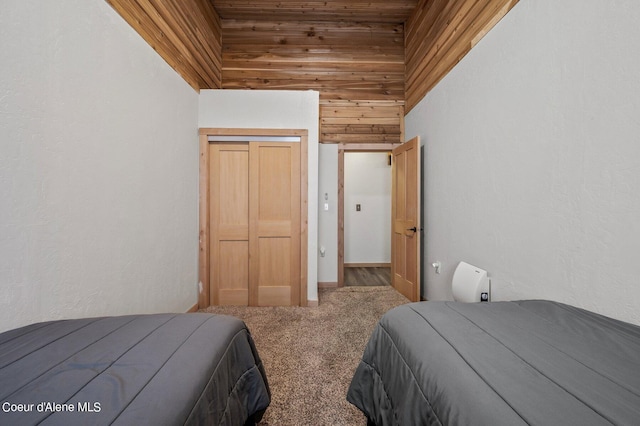 bedroom featuring carpet floors and a high ceiling