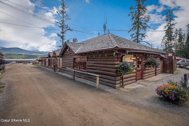 exterior space featuring a mountain view