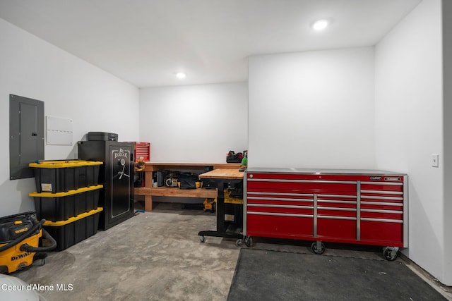 miscellaneous room with a workshop area and electric panel