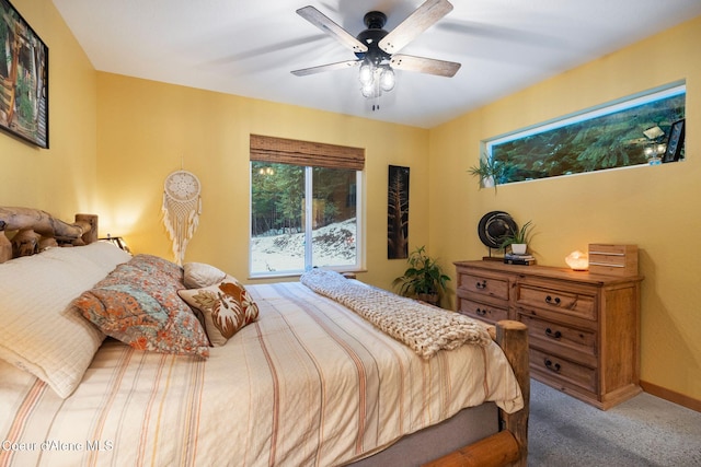 carpeted bedroom with ceiling fan