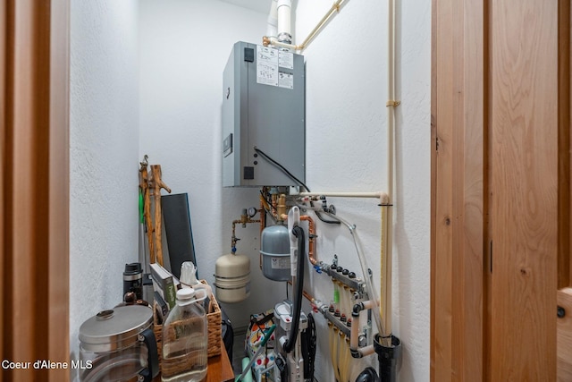 utility room with water heater