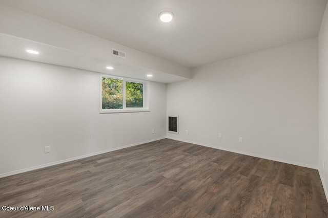 14895 N Crystal Springs Ln, Rathdrum, ID 83858 - below grade area with recessed lighting, dark wood-style flooring, and baseboards
