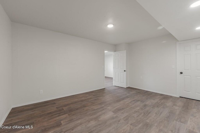14895 N Crystal Springs Ln, Rathdrum, ID 83858 - unfurnished room featuring wood finished floors, baseboards, and recessed lighting