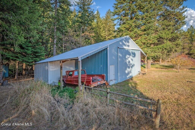 14895 N Crystal Springs Ln, Rathdrum, ID 83858 - view of pole building featuring a view of trees
