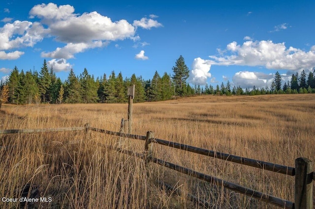 14895 N Crystal Springs Ln, Rathdrum, ID 83858 - view of yard featuring a rural view and a view of trees