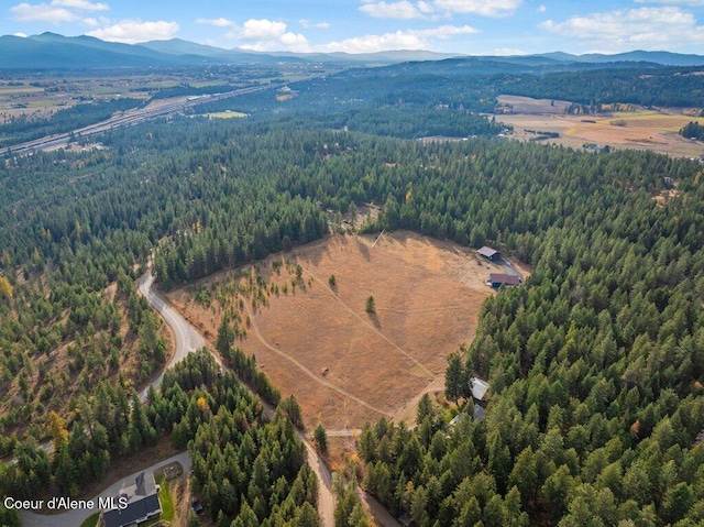 14895 N Crystal Springs Ln, Rathdrum, ID 83858 - view of property location featuring a forest and mountains