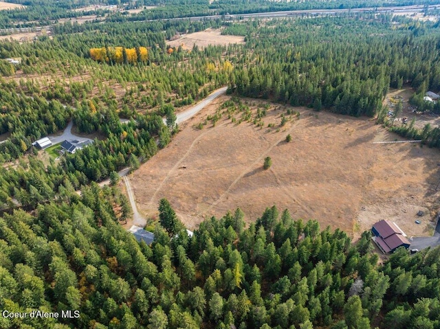 14895 N Crystal Springs Ln, Rathdrum, ID 83858 - view of property location with a heavily wooded area