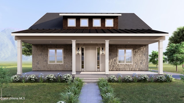 view of front of property with a front lawn and covered porch