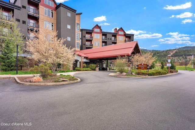 view of building exterior featuring a mountain view