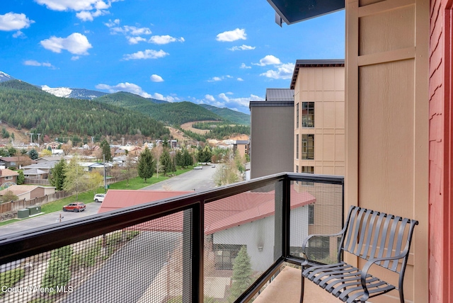 balcony featuring a mountain view