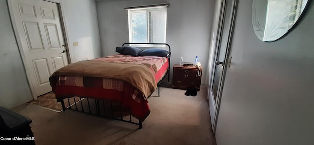 bedroom with light carpet