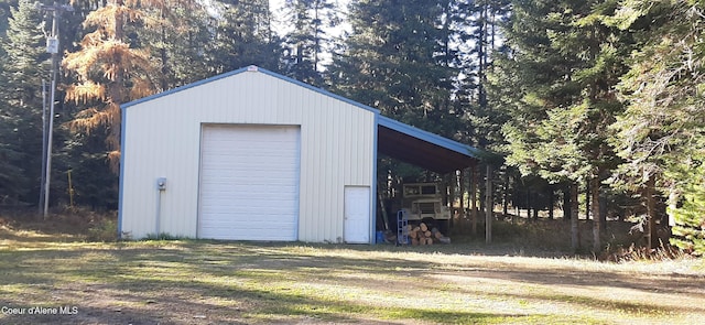 view of outdoor structure with a garage