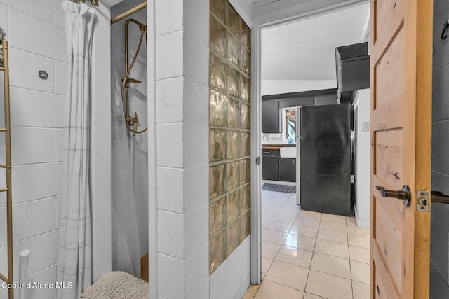 bathroom featuring tile patterned flooring