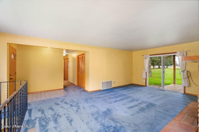 empty room featuring carpet flooring