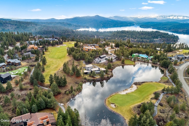 birds eye view of property featuring a water and mountain view