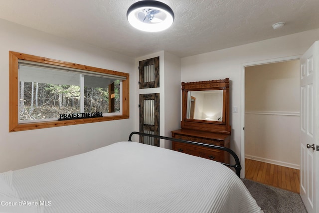 431 E Sunnyside Rd, Sandpoint, ID 83864 - bedroom featuring a textured ceiling and baseboards