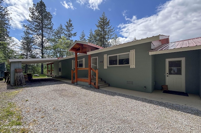 431 E Sunnyside Rd, Sandpoint, ID 83864 - view of front of house with metal roof and concrete block siding