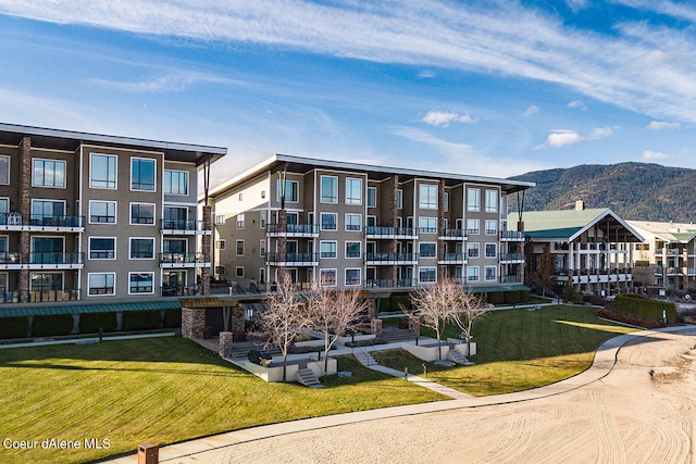 view of building exterior with a mountain view