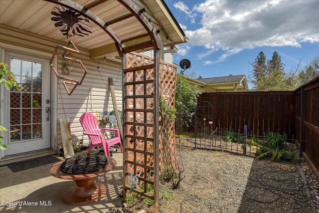 view of patio / terrace with fence