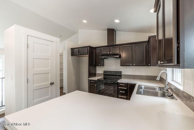 kitchen featuring black / electric stove, dark brown cabinetry, sink, and lofted ceiling