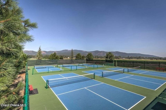 view of sport court with a mountain view