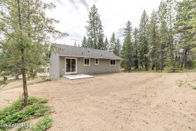 rear view of house with a patio