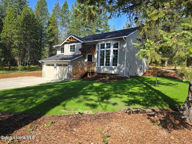 view of front facade featuring a front yard and a garage