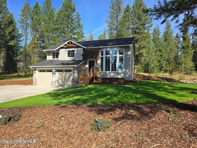 view of front facade with a front lawn and a garage