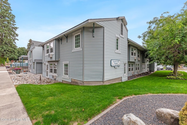 530 W Harrison Ave, Coeur Dalene, ID 83814 - view of side of property with a lawn
