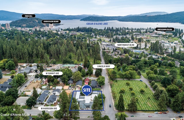 530 W Harrison Ave, Coeur Dalene, ID 83814 - aerial overview of property's location featuring a water and mountain view and property boundaries highlighted