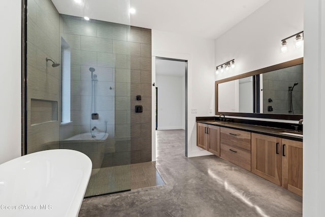 full bathroom with a freestanding bath, double vanity, a tile shower, and a sink