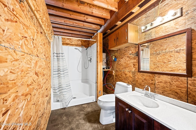 bathroom featuring toilet, vanity, concrete floors, and a shower with shower curtain