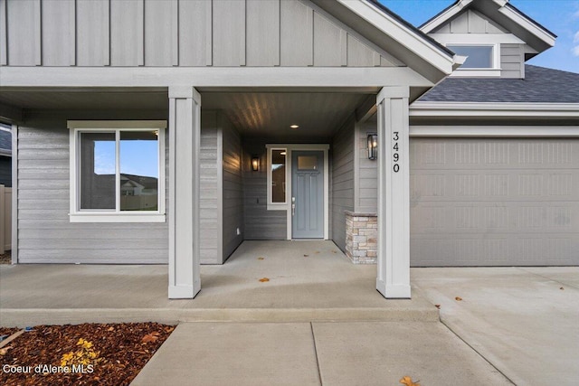 entrance to property featuring a garage