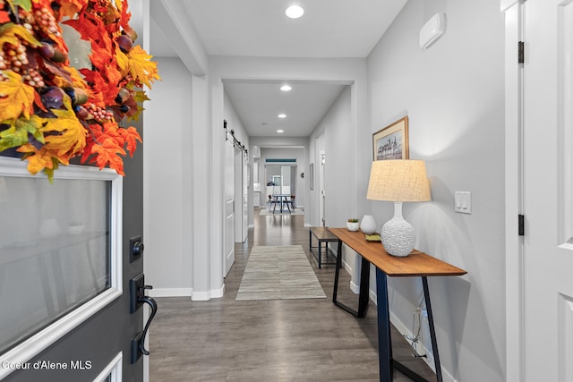 hall with dark hardwood / wood-style floors